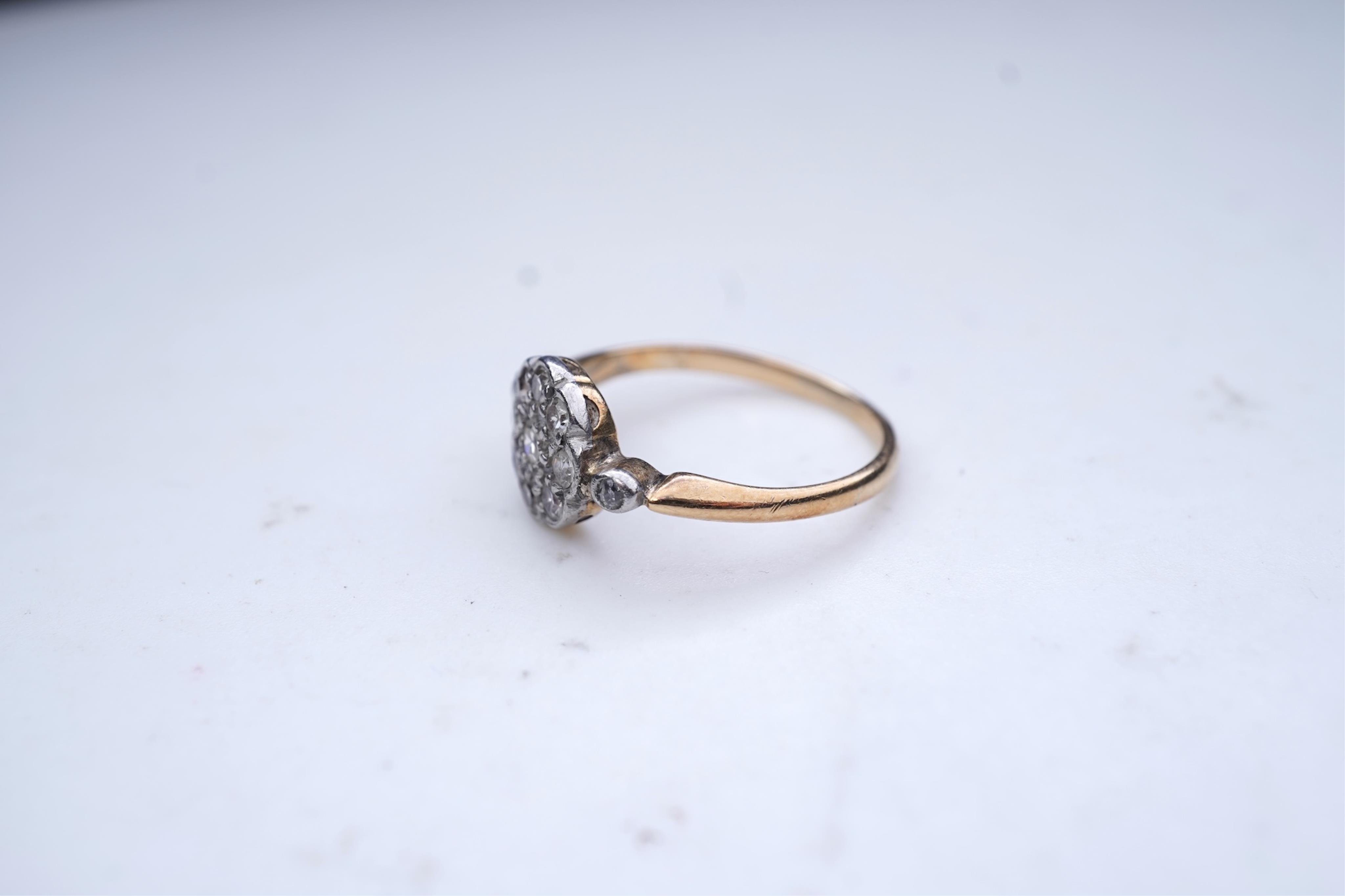 A diamond cluster ring, early 20th century